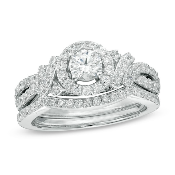 Previously Owned - Celebration Ideal 1 CT. T.w. Diamond Frame Bridal Set in 14K White Gold (I/I1)