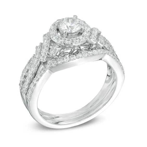 Previously Owned - Celebration Ideal 1 CT. T.w. Diamond Frame Bridal Set in 14K White Gold (I/I1)