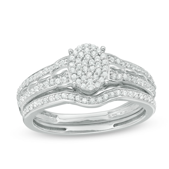 Previously Owned - 1/3 CT. T.w. Composite Diamond Oval Bridal Set in 10K White Gold
