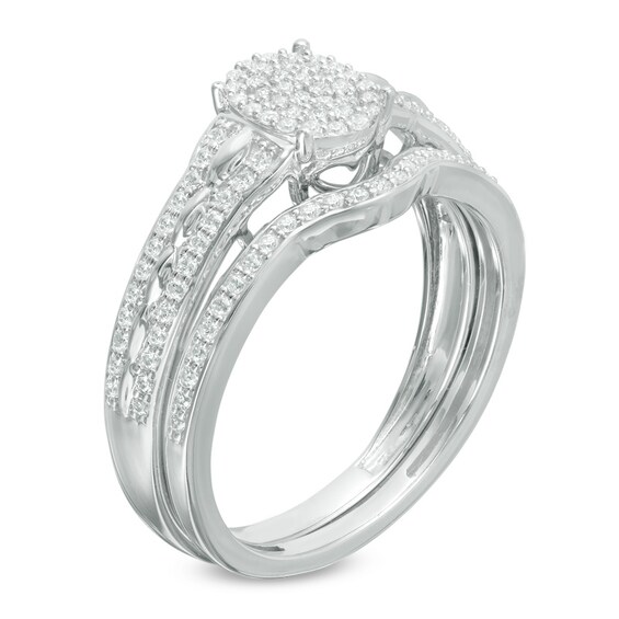 Previously Owned - 1/3 CT. T.w. Composite Diamond Oval Bridal Set in 10K White Gold