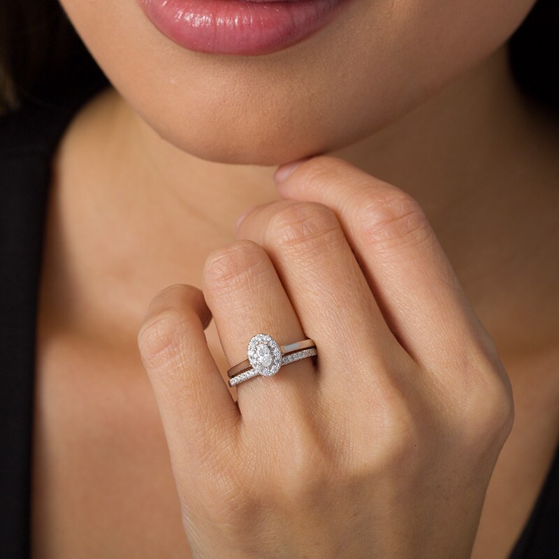 Main Image 2 of Previously Owned - 5/8 CT. T.W. Oval Diamond Frame Bridal Set in 14K White Gold