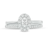 Thumbnail Image 4 of Previously Owned - 5/8 CT. T.W. Oval Diamond Frame Bridal Set in 14K White Gold