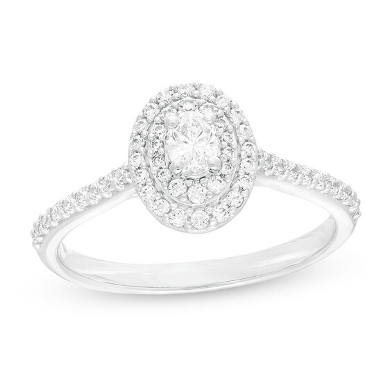Previously Owned - 1/2 CT. T.w. Oval Diamond Double Frame Engagement Ring in 10K White Gold