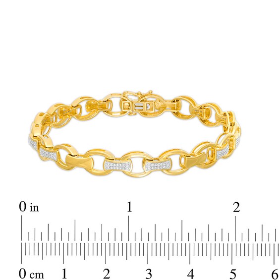 Previously Owned - 1/3 CT. T.w. Diamond Open Oval and Bamboo Link Bracelet in 10K Gold - 8.5"