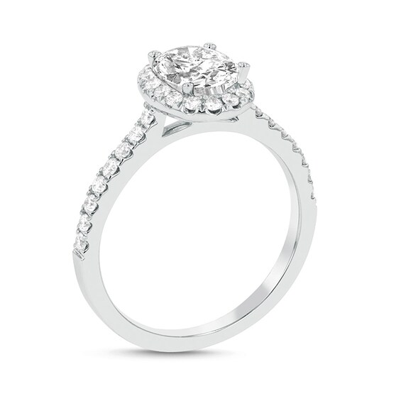 Previously Owned - 1 CT. T.w. Oval Diamond Frame Engagement Ring in Platinum (G/Si2)