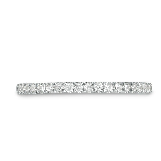 Previously Owned - 1/4 CT. T.w. Diamond Wedding Band in 10K White Gold