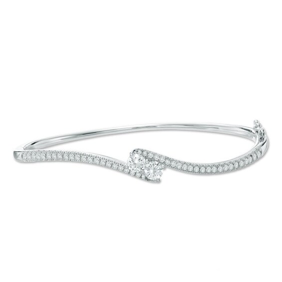 Previously Owned - Ever UsÂ® 1/2 CT. T.w. Two-Stone Diamond Bypass Bangle in 14K White Gold