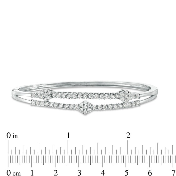 Previously Owned - 1 CT. T.w. Composite Diamond Three Flower Bangle in 10K White Gold