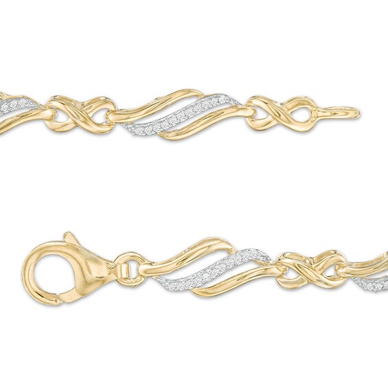 Previously Owned - 1/4 CT. T.w. Diamond Alternating Infinity Bracelet in 10K Gold – 7.5"