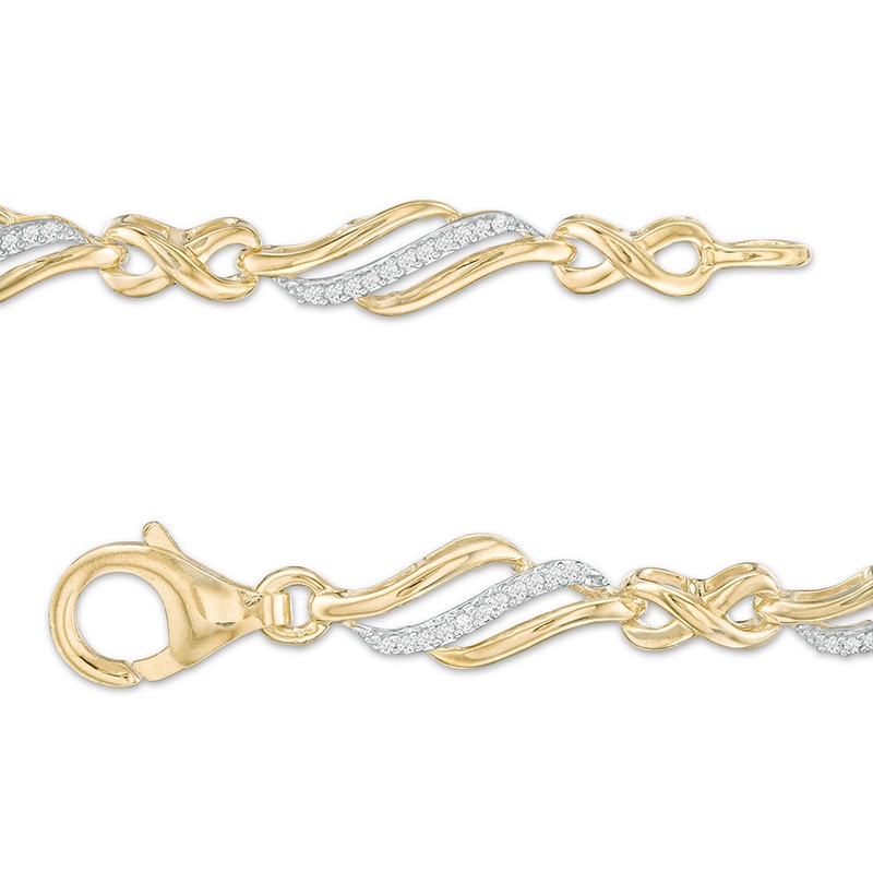 Main Image 3 of Previously Owned - 1/4 CT. T.W. Diamond Alternating Infinity Bracelet in 10K Gold – 7.5"