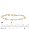 Thumbnail Image 4 of Previously Owned - 1/4 CT. T.W. Diamond Alternating Infinity Bracelet in 10K Gold – 7.5"