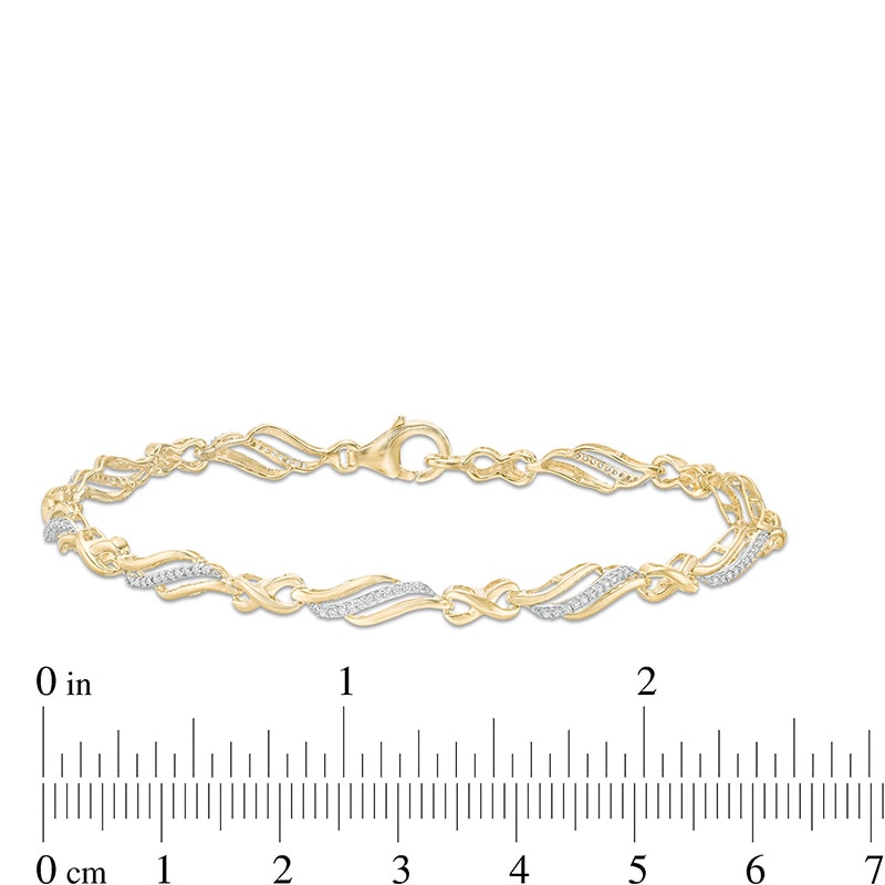 Main Image 4 of Previously Owned - 1/4 CT. T.W. Diamond Alternating Infinity Bracelet in 10K Gold – 7.5"