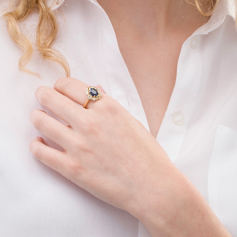 Main Image 2 of Previously Owned - Oval Blue Sapphire and 1/20 CT. T.W. Diamond Ornate Ring in 10K Gold