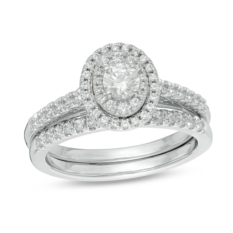Main Image 1 of Previously Owned - 3/4 CT. T.W. Diamond Double Oval Frame Bridal Set in 14K White Gold