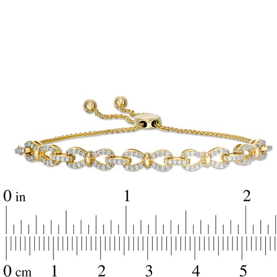 Previously Owned - 1/2 CT. T.w. Diamond Bow Link Bolo Bracelet in 10K Gold - 9.5"