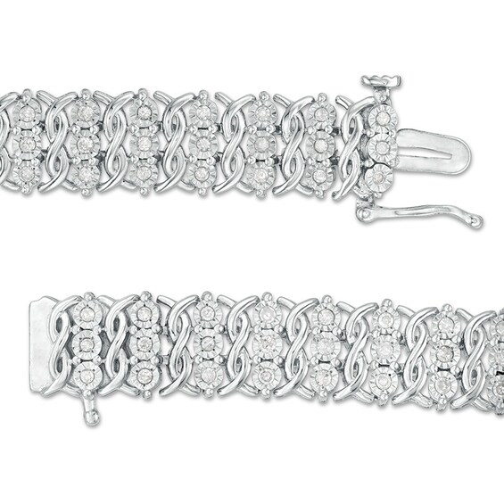 Previously Owned - 1 CT. T.w. Diamond Triple Row Twist Bracelet in Sterling Silver - 7.5"