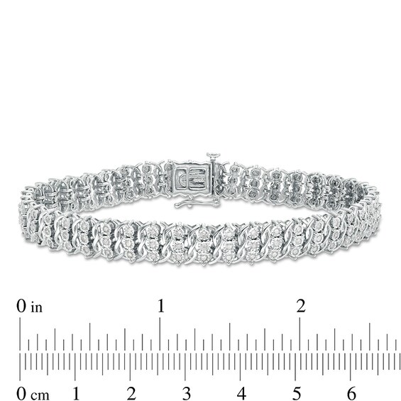 Previously Owned - 1 CT. T.w. Diamond Triple Row Twist Bracelet in Sterling Silver - 7.5"