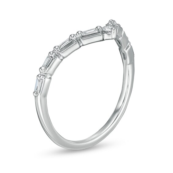 Previously Owned - 1/6 CT. T.w. Baguette and Round Diamond Chevron Anniversary Band in 14K White Gold