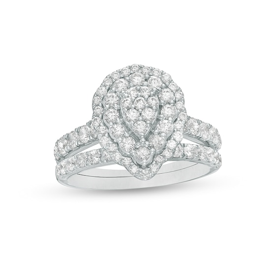 Previously Owned - 1-1/2 CT. T.w. Multi-Diamond Pear Diamond Scallop Frame Bridal Set in 10K White Gold