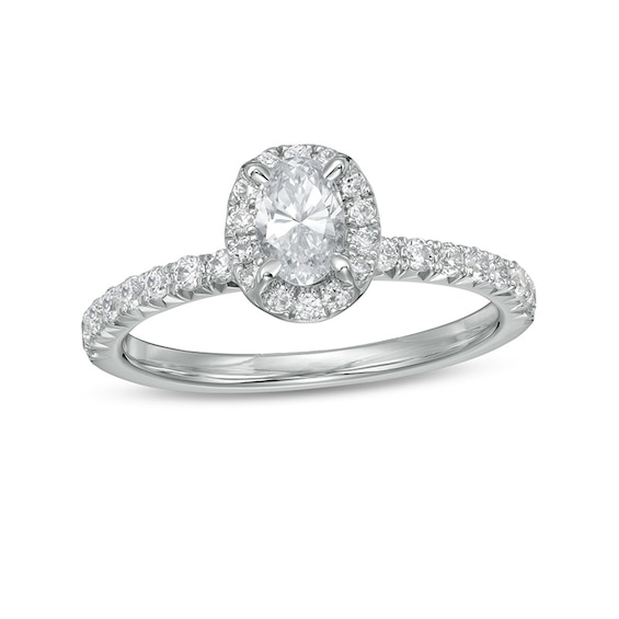 Previously Owned - 1 CT. T.w. Oval Diamond Frame Engagement Ring in 14K White Gold (I/I2)