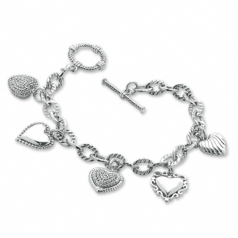 Main Image 1 of Previously Owned - 1/5 CT. T.W. Diamond Heart Assorted Charm Bracelet in Sterling Silver