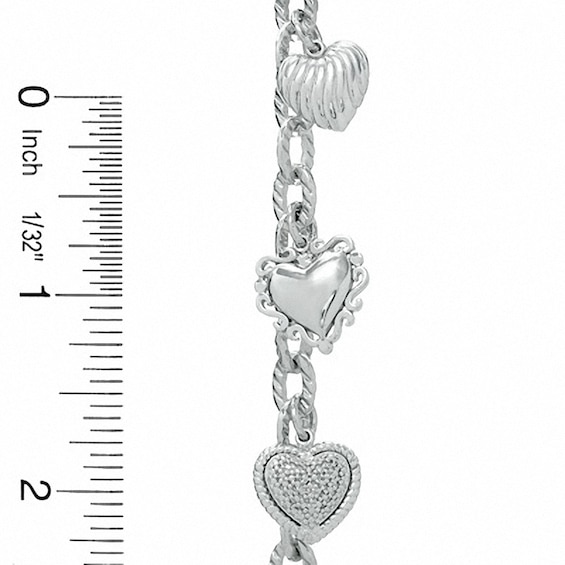 Previously Owned - 1/5 CT. T.w. Diamond Heart Assorted Charm Bracelet in Sterling Silver
