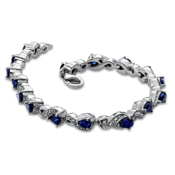 Previously Owned - Pear-Shaped Lab-Created Blue Sapphire and 1/10 CT. T.w. Diamond Bracelet in Sterling Silver