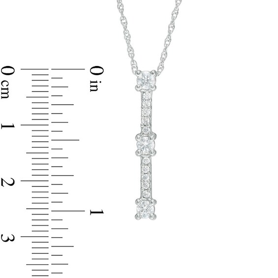 Previously Owned - 1/2 CT. T.w. Diamond Vertical Three Stone Pendant in 10K White Gold