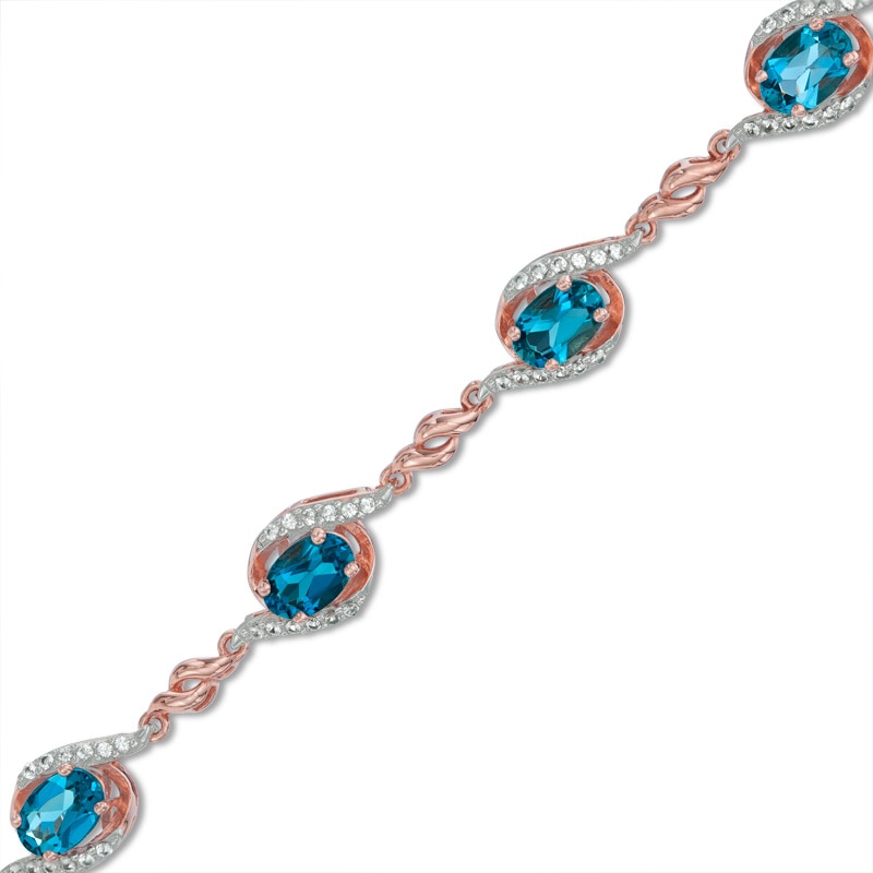 Main Image 1 of Previously Owned - London Blue Topaz and White Lab-Created Sapphire Bracelet in Sterling Silver with 14K Rose Gold Plate