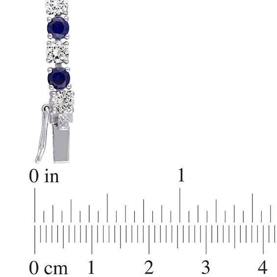 Previously Owned - 4.0mm Lab-Created Blue and White Sapphire Alternating Tennis Bracelet in Sterling Silver - 7.25"