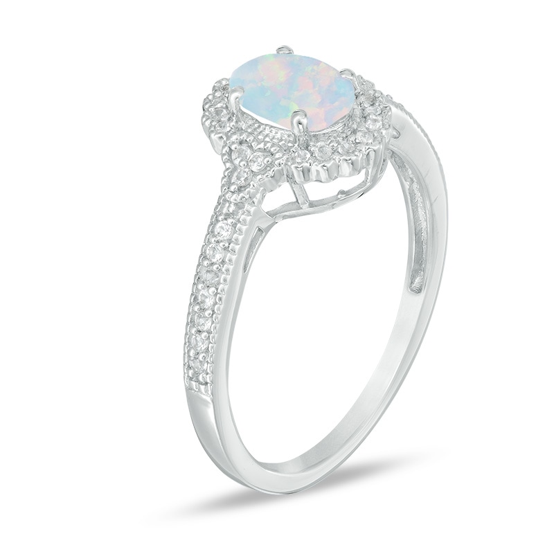 Main Image 2 of Previously Owned - Oval Lab-Created Opal and 1/8 CT. T.W. Diamond Frame Vintage-Style Ring in 10K White Gold