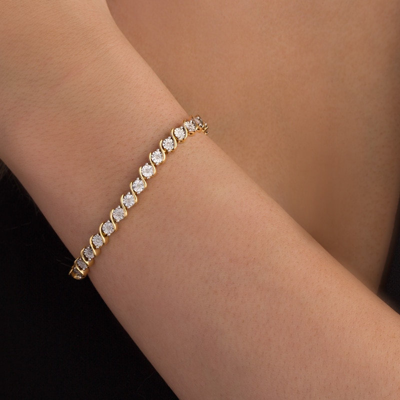Main Image 2 of Previously Owned - 1/4 CT. T.W. Diamond "S" Tennis Bracelet in Sterling Silver with 14K Gold Plate - 7.25"
