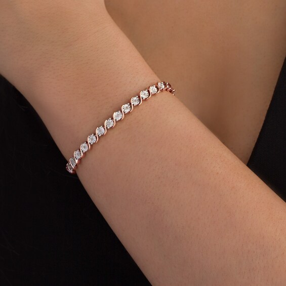 Previously Owned - 1/4 CT. T.w. Diamond "S" Tennis Bracelet in Sterling Silver with 14K Rose Gold Plate - 7.25"
