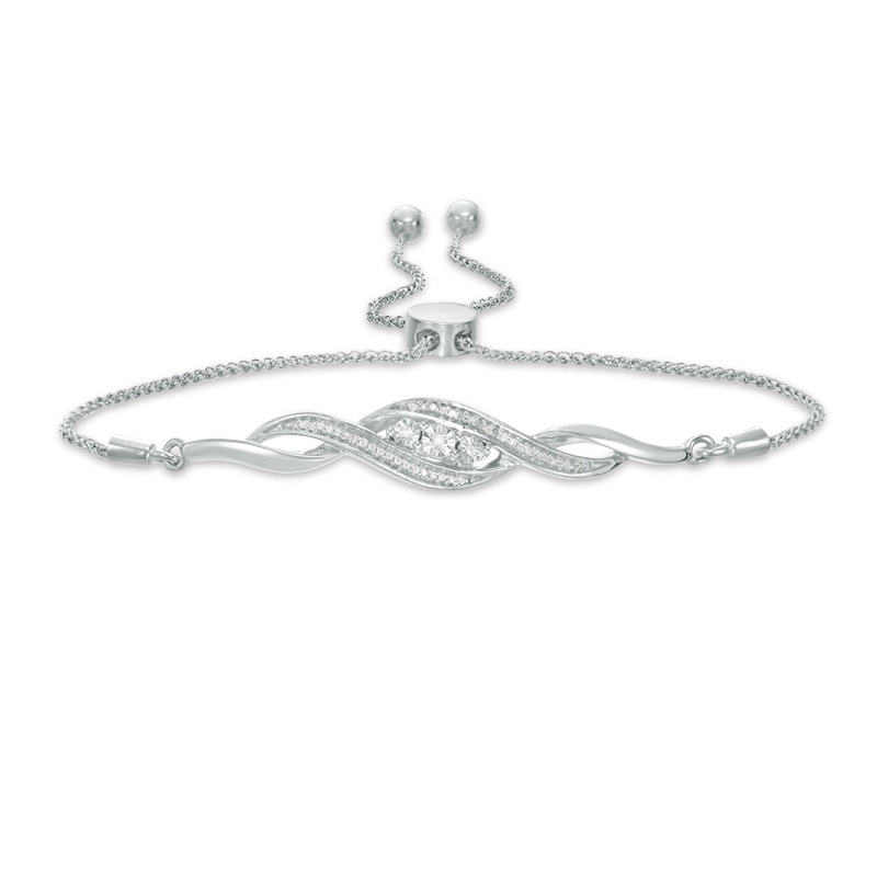 Main Image 1 of Previously Owned - 1/15 CT. T.W. Diamond Three Stone Twist Bolo Bracelet in Sterling Silver - 9.5"