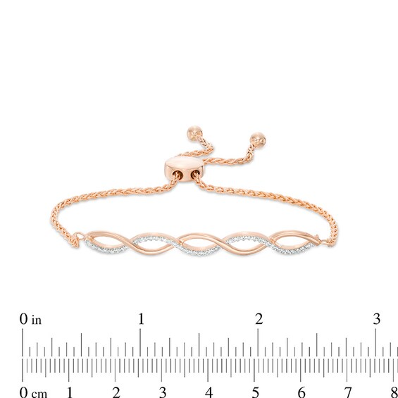 Previously Owned - 1/10 CT. T.w. Diamond Twist Bolo Bracelet in Sterling Silver with 14K Rose Gold Plate - 9.5"