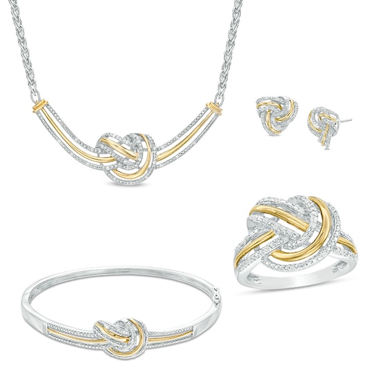 Previously Owned - 1/5 CT. T.w. Diamond Love Knot Four Piece Set in Sterling Silver with 10K Gold Plate