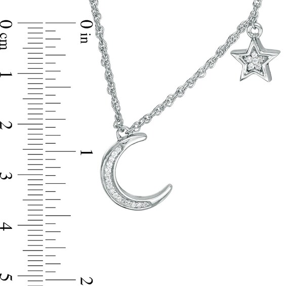 Previously Owned - 1/15 CT. T.w. Diamond Crescent Moon and Star Necklace in Sterling Silver