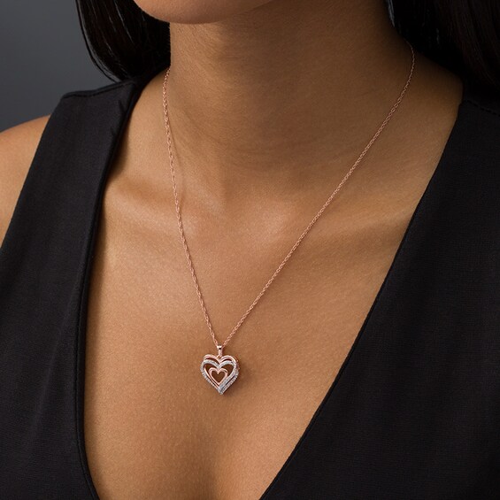 Previously Owned - 1/10 CT. T.w. Diamond Layered Heart Pendant in 10K Rose Gold