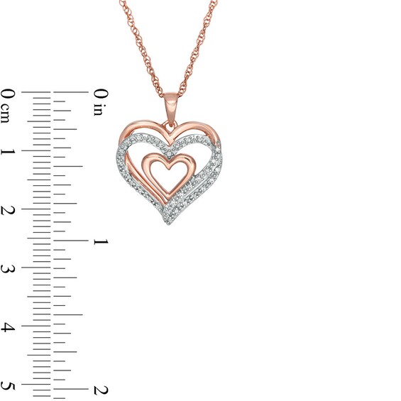 Previously Owned - 1/10 CT. T.w. Diamond Layered Heart Pendant in 10K Rose Gold