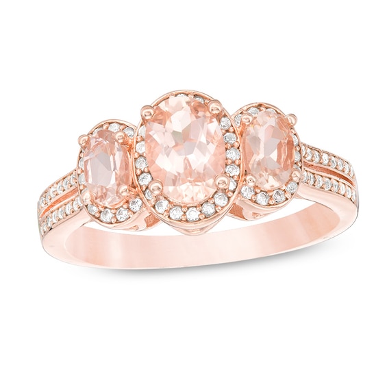 Previously Owned - Oval Morganite and 1/4 CT. T.w. Diamond Three Stone Frame Ring in 10K Rose Gold