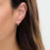 Thumbnail Image 2 of Previously Owned - 1/15 CT. T.W. Diamond Huggie Hoop Earrings in 14K Gold