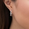 Thumbnail Image 2 of Previously Owned - 1/4 CT. T.W. Diamond Twist Hoop Earring in 10K White Gold