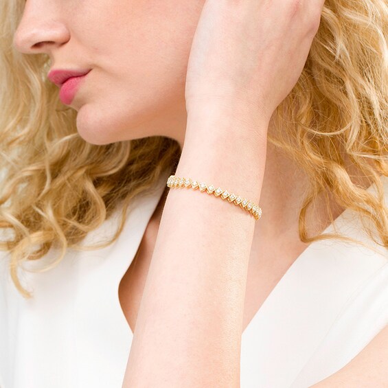 Previously Owned - 2 CT. T.w. Diamond Tilted Square Tennis Bracelet in 10K Gold - 7.25"