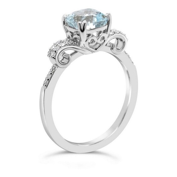 Previously Owned - Cushion-Cut Aquamarine and 1/10 CT. T.w. Diamond Scrolling Ribbon Side Accent Ring in Sterling Silver