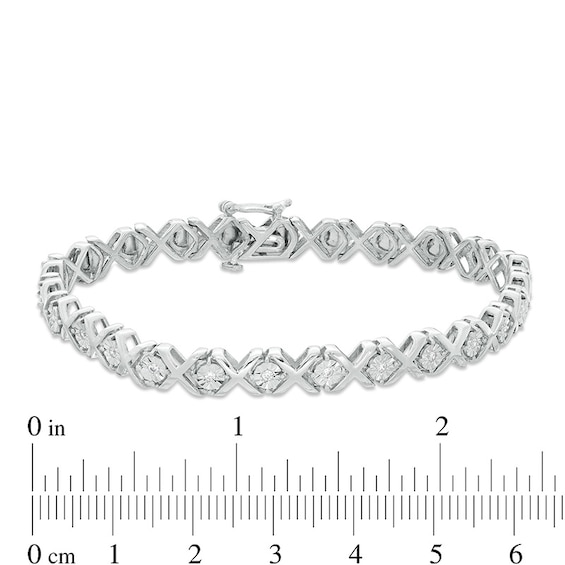 Previously Owned - 1/10 CT. T.w. Diamond "Xo" Bracelet in Sterling Silver - 7.25"