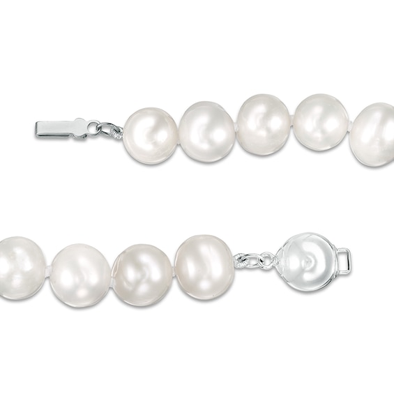 Previously Owned-9.0-10.0mm Freshwater Cultured Pearl Knotted Strand Necklace with Sterling Silver Clasp-18"