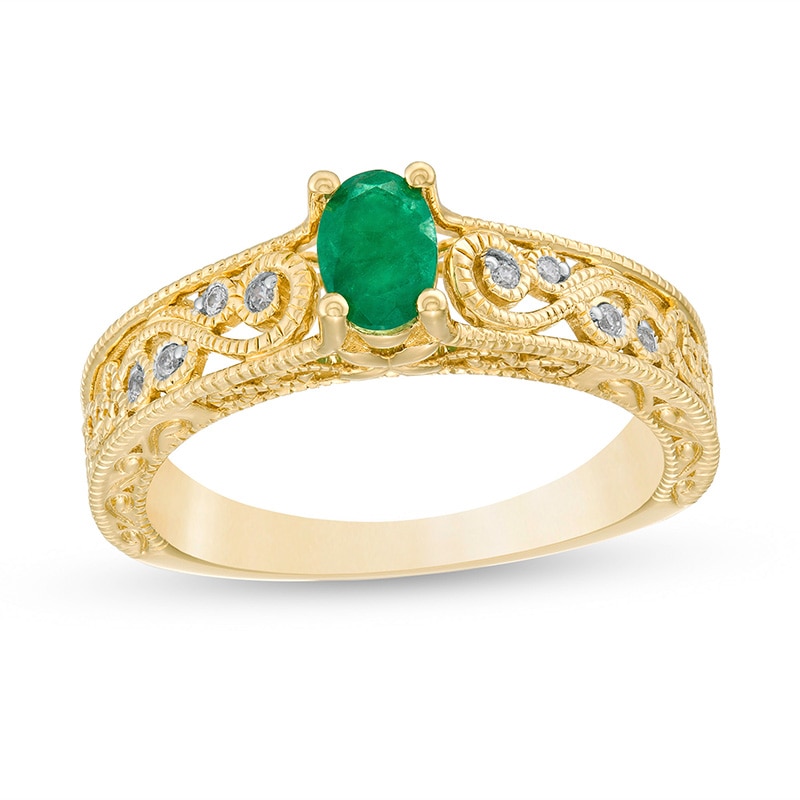 Main Image 1 of Previously Owned - Oval Emerald and 1/20 CT. T.W. Diamond Scroll Open Shank Vintage-Style Ring in 10K Gold