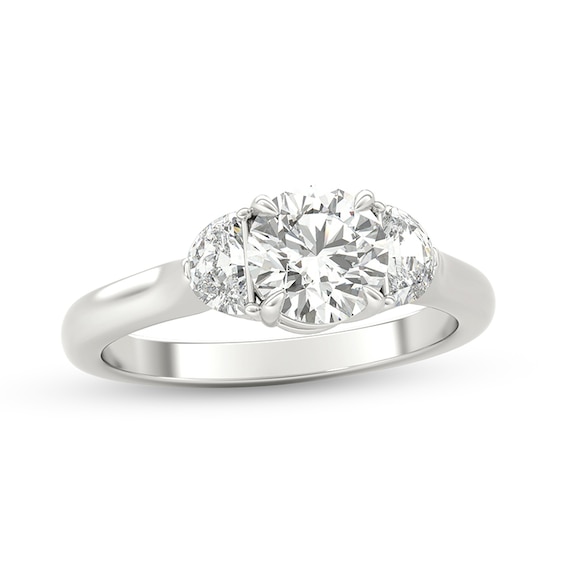 Previously Owned - 1 CT. T.w. Half-Moon-Shaped and Round Diamond Three Stone Engagement Ring in Platinum