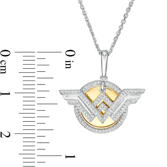 Previously Owned - Wonder Womanâ¢ Collection 1/10 CT. T.w. Diamond Symbol Disc Pendant in Sterling Silver and 10K Gold
