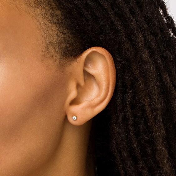 Previously Owned - 1/4 CT. T.w. Diamond Stud Earrings in 14K Gold